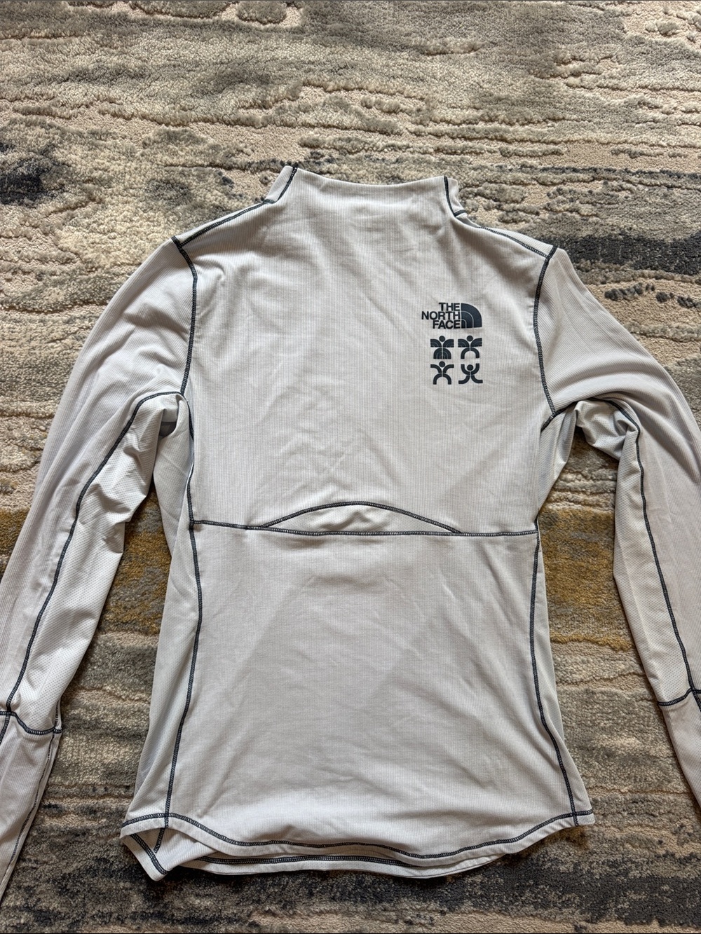 The North Face Light Blue Long Sleeve Performance Top with Contrast Stitching